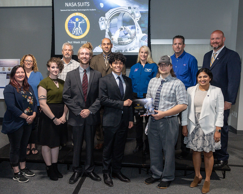 Team receiving recognition at Johnson Space Center